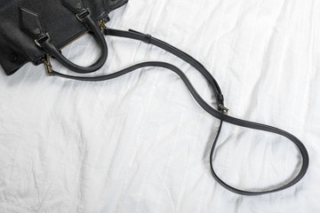 Female bag on white textile