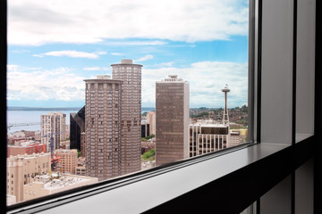 Fototapeta na wymiar View of downtown Seattle and the Space Needle through a picture window