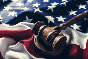 Wooden gavel and USA flag