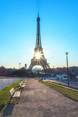 Landscape view of a warm sunrise over Paris and the Eiffel tower