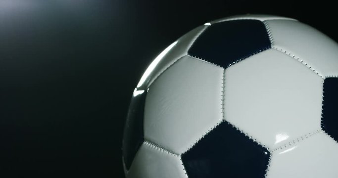 Macro shot of soccer ball, ball used in international cups, in matches. Concept: football betting, competition, sport.