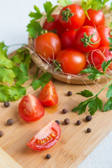 Fresh vegetables tomato and pepper on a light background in rustic style