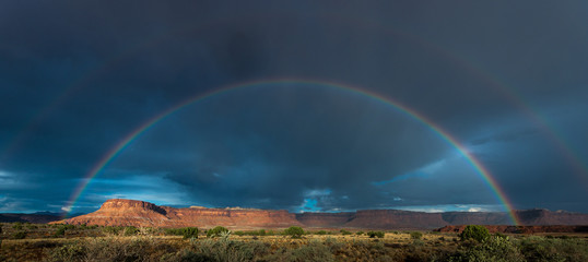 Rainbow in dark sky near Canyonlands Needles District, UT
