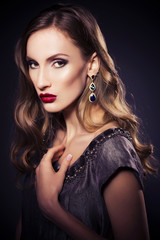 Fototapeta premium Brunette beautiful luxury woman in dress with clear skin and eve