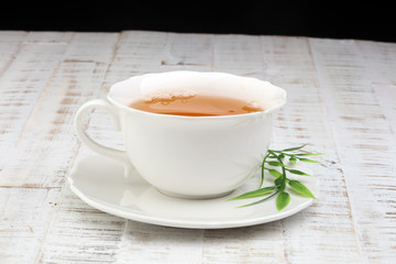 Tea. Herbal tea. Mint leaf. Tea in a glass cup, mint leaves, dried tea, sliced lime. herbs on a slate plate in a restaurant or teahouse 