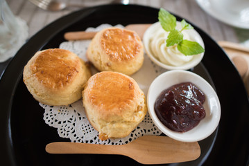 scones with strawberry jam
