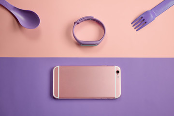 Flat lay fitness set on rose and sereity background