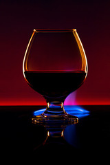 glass of brandy and a flame of fire