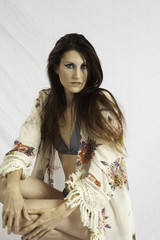 Pretty woman in swim suit, squatting