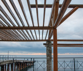 wooden gazebo on the sea background high quality