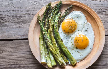Fotobehang Roasted asparagus with fried eggs © alex9500