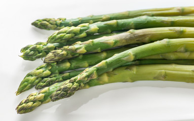 Bunch of cooked asparagus on the plate