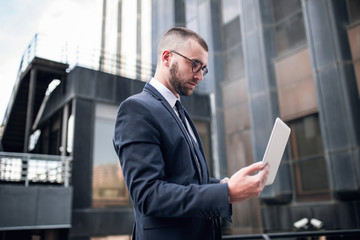 young businessman using a laptop computer