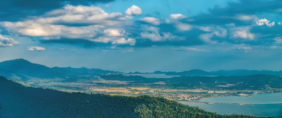 Panoramic view of blue sky, sea and mountain seen from Cable Car viewpoint, Langkawi Island, Malaysia.