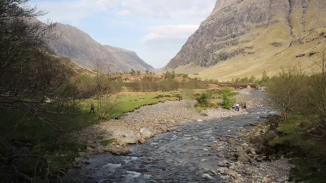 Glencoe river Clachaig Scotland UK with mountains in Scottish Highlands in spring