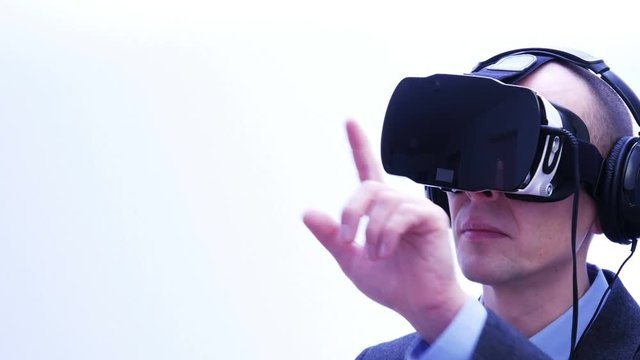 Businessman typing on virtual touch screen - 4 K