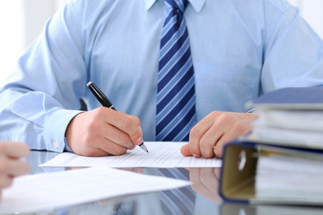 Bookkeepers or financial inspector making report, calculating or checking balance. Audit concept.