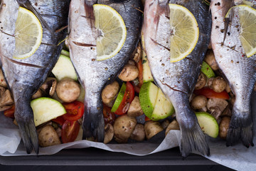 bream with lemon and vegetables