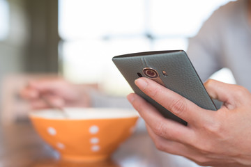 eat cereal with phone