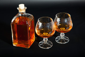 Bottle and glasses of brandy