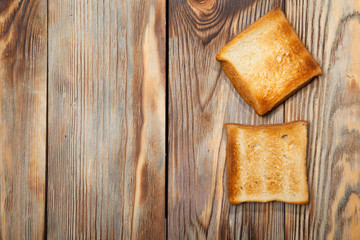 Toast on a rustic wooden background