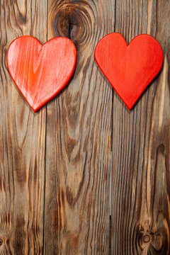 Holidays gift and heart on wooden rustic background. Valentines day