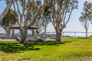 Pavilion at Embarcadero Park South in San Diego, California with Coronado Bridge in the background.