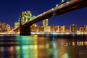 Fototapeta na wymiar New York City - beautiful sunset over manhattan with and brooklyn bridge