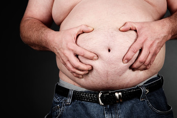 Naklejka premium Overweight stomach