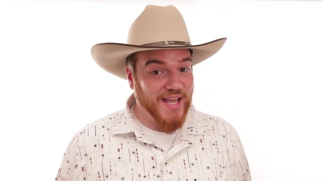 Hipster millennial cowboy showing handfull of poker chips