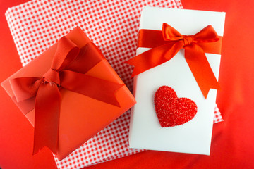 Valentines gift box with a red bow on red background Image of Va