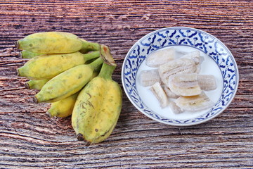 Cultivated banana in coconut milk and wholes of banana.