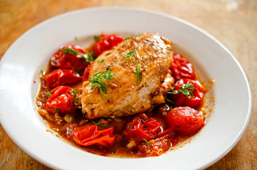 Fried chicken fillet with tomato - 132486700
