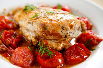 Fried chicken fillet with tomato