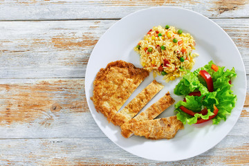 Crispy Southern Fried Pork Chops with risotto and fresh salad