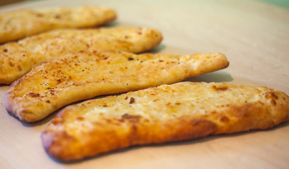 khachapuri (ghvezeli) in a half moon form for christmas day, Geo