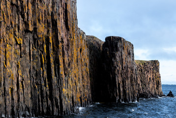 Basalt column rock formations at the Stykkisholmur harbor, sanefellsnes peninsula, Iceland © paveldobrovsky