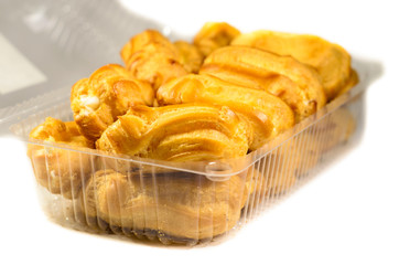 Eclair cakes isolated on white