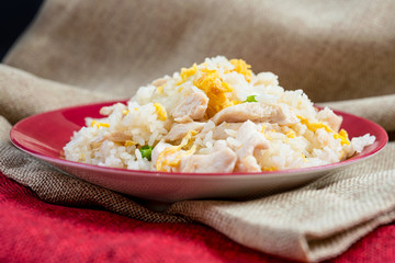 Homemade Chinese fried rice with vegetables and fried eggs
