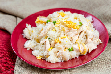Homemade Chinese fried rice with vegetables and fried eggs