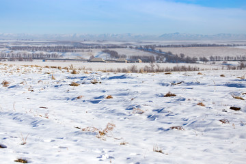 horizon of snow and blue sky