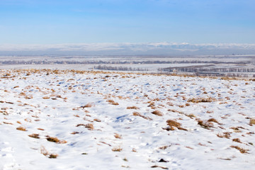 horizon of snow and blue sky