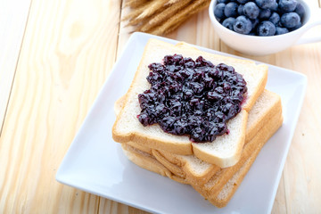 slice of bread with jam blueberry