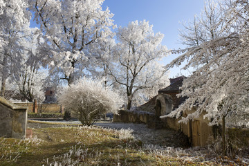 Beautiful fairytale snowy winter countryside with blue Sky in Central Bohemia, Czech Republic