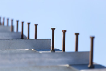 Obraz premium metal construction on a background of blue sky