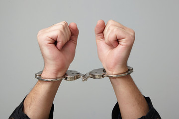 Handcuffed man.