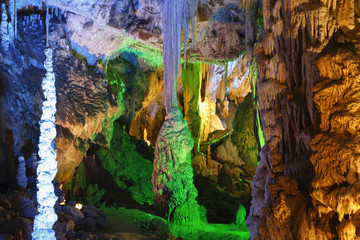 cave with many stalagmites and stalactites