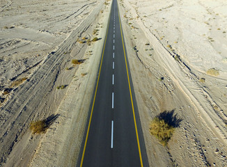 Empty desert road aerial view
