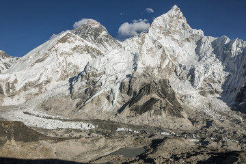 The moon rises over the Mt. Everest (8848 m) and Nuptse (7864 m) (view from Kala Patthar) - Nepal,...