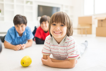 Fototapeta premium Children group on floor in house